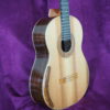 classical concert guitar of the luthier graham caldersmith availaible on our website www.concert-classical-guitar.com cedar table and indian rosewood back and sides, three quarter view